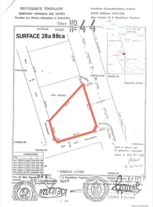 Terrain 2850 m² en vente en bordure du goudron à Adétikopé – 190 millions FCFA