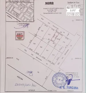 Terrain avec maison de location en demi-lot à vendre à Togo 2000 – 23 millions FCFA