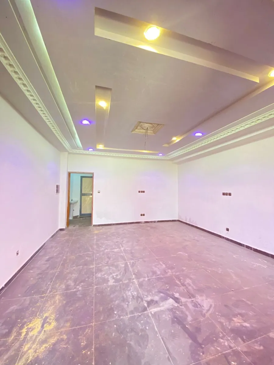 Villa 3 chambres sur demi-lot en vente à Kégué Station Cap, 300 m du goudron – 65 millions FCFA
