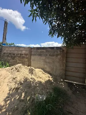 Terrain demi-lot clôturé en vente à Sanguera IPG – 15 millions FCFA — photo 3