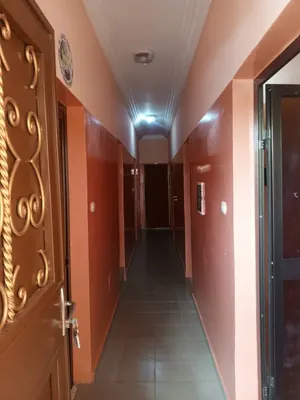Vente d'une maison à Adidogomé Wonyomé, avec dépendance, titre foncier personnel, demi-lot, à 70m du goudron – 65 millions FCFA à débattre — photo 3