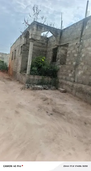 Vente d'une villa à Agoè Legbassito Avinato, 5 chambres, 1 lot (600 m²), en angle de rue, niveau dalle – 40 millions FCFA — photo 10
