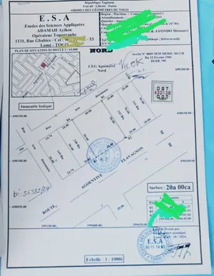 Terrain 3 lots et 1/4 à vendre à Agoè Carrefour Commando – 2000 m² – 55 millions FCFA le lot