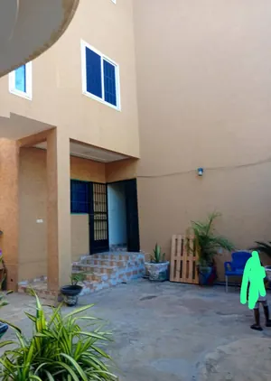 Vente d'une villa à Hountigomé, R+2, 10 chambres, 447 m², angle de rue – 250 millions FCFA — photo 4