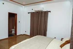 Vente d'une villa duplex meublée à Agodéké, 12 chambres, 600 m², titre foncier personnel – 250 millions FCFA — photo 22