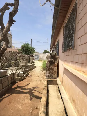Vente d'un terrain à Djidjolé, 688 m², bord des pavés, angle de rue – 150 millions FCFA — photo 4
