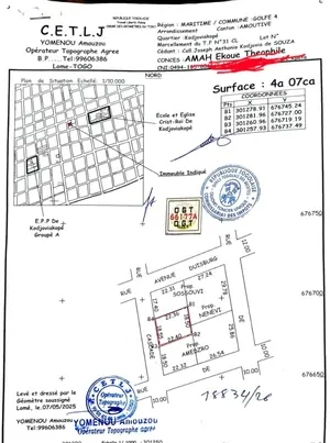 Terrain 407 m² avec ancienne construction en vente à Kodjoviakopé, proche du goudron – 90 millions FCFA