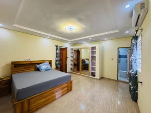 Vente d'une villa à Ségbé avant l'église catholique Akato, meublée, 3 chambres, 300 m², avec dépendance et jardin – 63 millions FCFA — photo 5