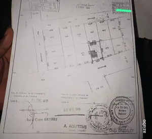 Terrain demi-lot en vente au bord du goudron à Totsi – 35 millions FCFA