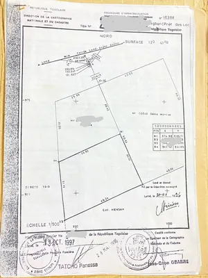 Terrain 2 lots en vente en angle de rue à Kpogan – 30 millions FCFA le lot