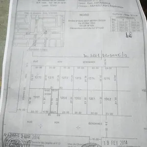 Vente d'une maison à Hédzranawoé Réveil d'Or, demi-lot bâti, 2 chambres-salon + 2 chambres-salon + 2 pièces + 2 boutiques, bord de rue en projet de bitumage – 45 millions FCFA