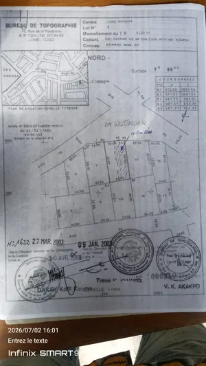 Terrain demi-lot en vente en face du CEG à Baguida – 22 000 000 FCFA