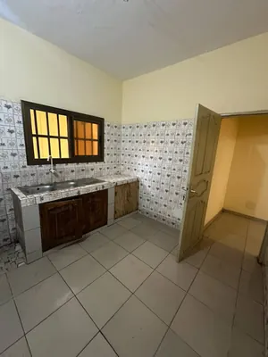 Terrain 1 lot clôturé et bâti 6 pièces en vente à Amadahomé (Hotel Stonia) – 45 millions FCFA