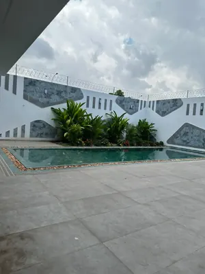 Vente d'une villa à Tokoin Wuiti, 5 chambres, R+2, avec piscine et jardin – 820 millions FCFA à débattre — photo 6