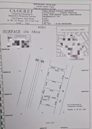Vente d'un terrain à Agoè Assiyéyé, demi-lot 12×25 en bord de goudron – 50 millions FCFA