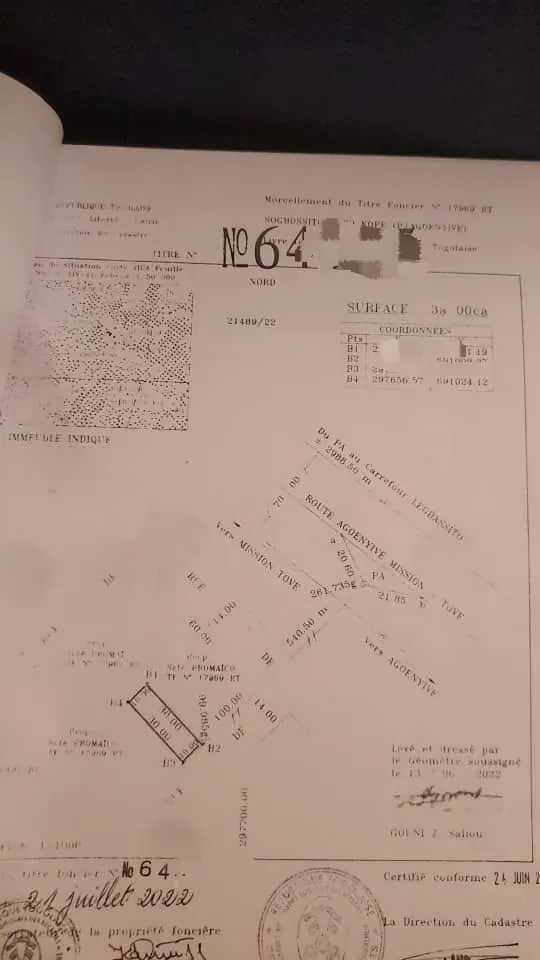 Vente d'un terrain à Agoé Sogtbossito, demi-lot clôturé – 18 millions FCFA
