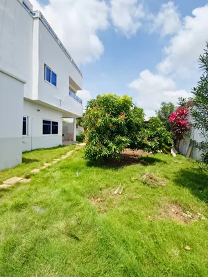 Vente d'une villa à Agoè Zongo École Malaïka, R+1 avec dépendances, jardin, titre foncier personnel – 75 millions FCFA — photo 16
