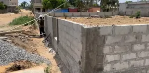 Terrain 2 lots clôturé en angle de rue en vente à Avépozo – 65 millions FCFA — photo 2