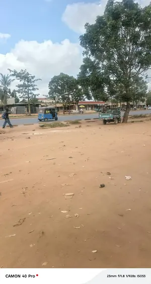 Vente d'un terrain à Agoè Legbassito, demi-lot (10/30) en face du goudron, idéal activités commerciales – 50 millions FCFA — photo 2
